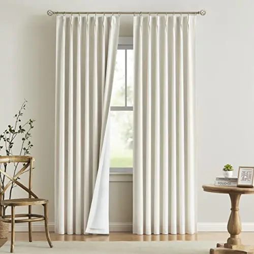Vision Home natural color pinch pleated blackout curtains hanging on window