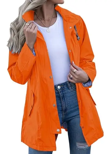 Kikibell women's lined rain jacket in orange with adjustable waist