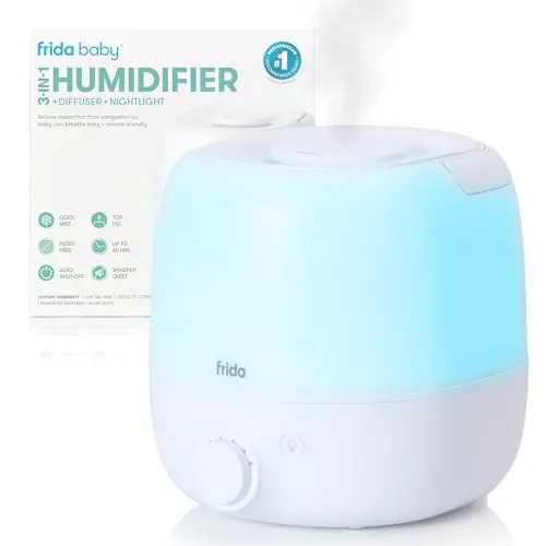 Frida Baby white humidifier with carry handle and nightlight